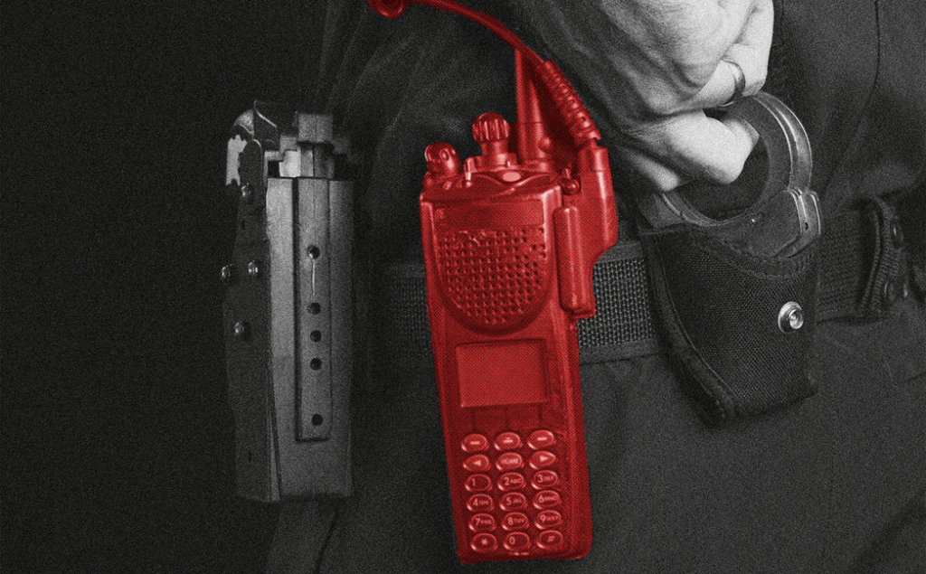 Photo illustration of a red-colored radio attached to a police officer's belt.