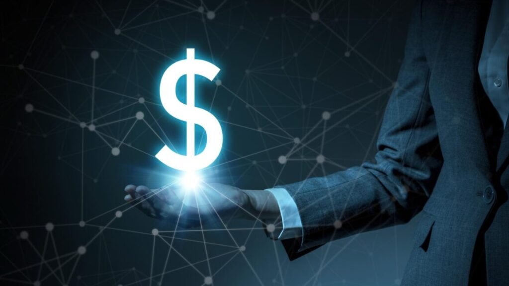 FCC Democrat: Trump admin is declaring “Mission Accomplished” on broadband Illustration of a dollar symbol floating on a woman's hand