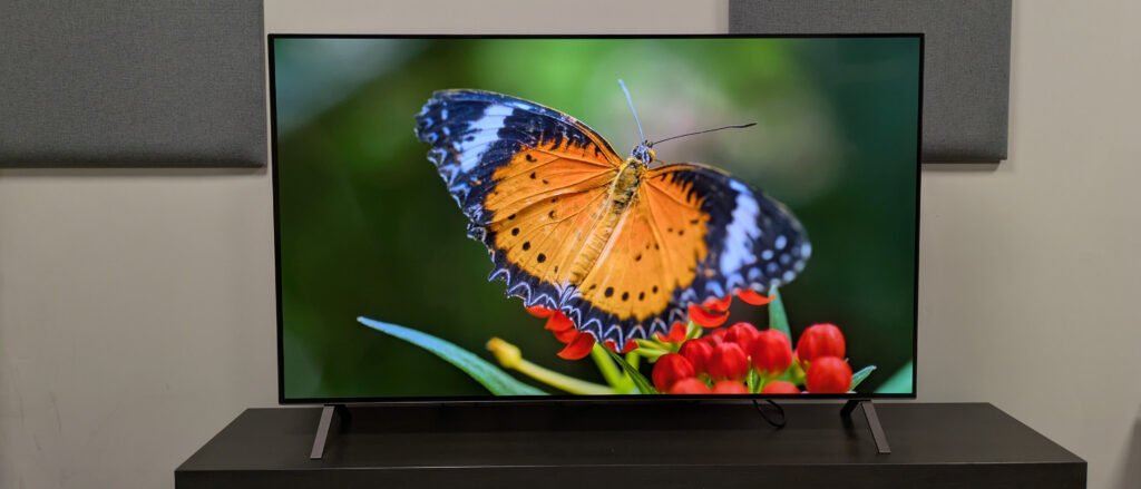 LG B5 hero image with orange butterfly on screen