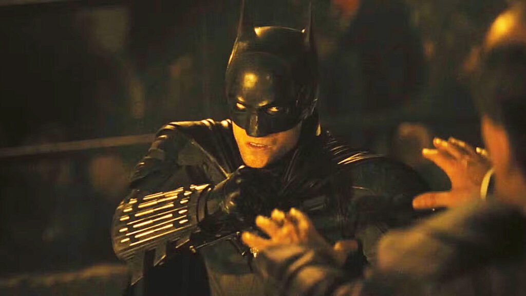 Robert Pattinson's The Dark Knight preparing to punch someone in 2022's The Batman movie