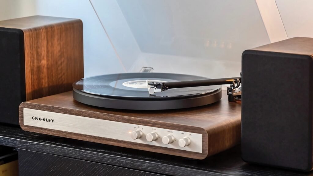 The Crosley C65 record player and speakers photographed from a slight angle