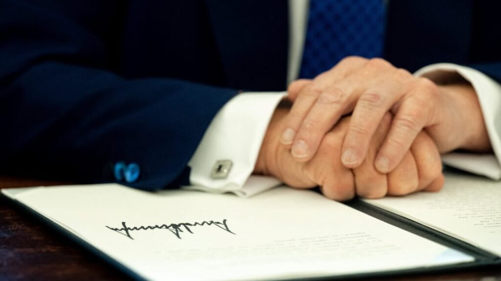 US President Donald Trump's signature is seen on an executive order in the Oval Office of the White House in Washington, DC, on February 14, 2025. (Photo by SAUL LOEB / AFP) (Photo by SAUL LOEB/AFP via Getty Images)