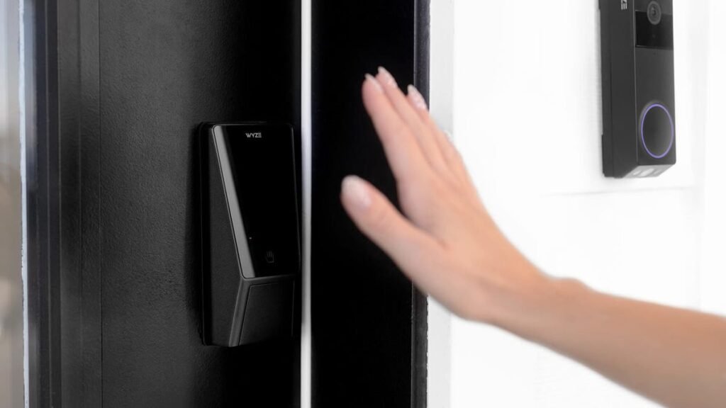 Hand hovering in front of the Wyze Palm Lock.