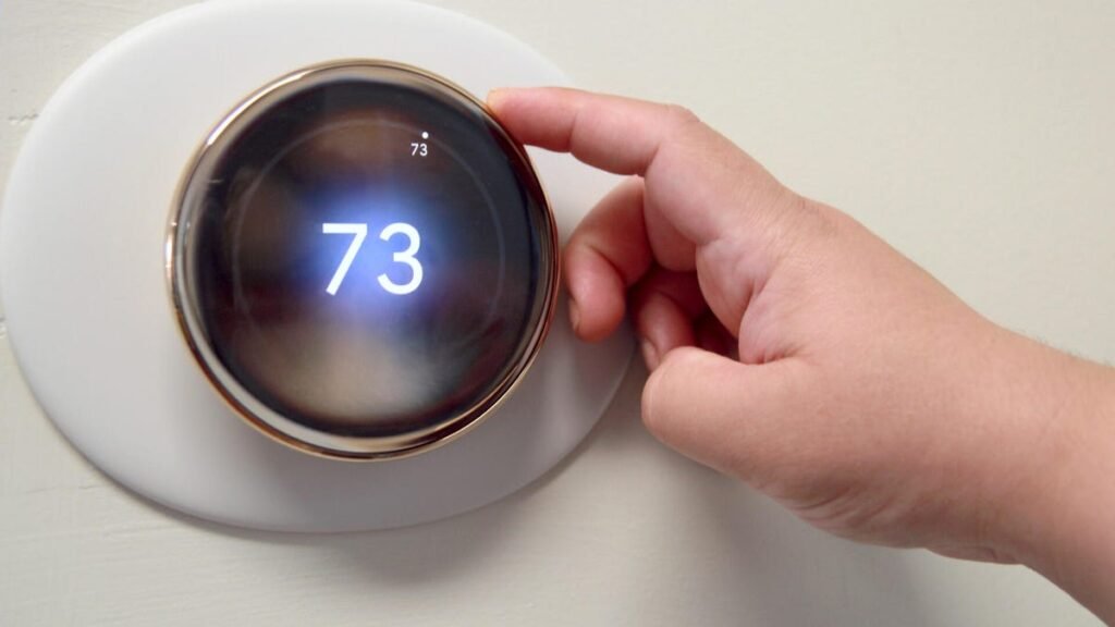 Setting your thermostat to this temperature could save you money (and keep you cozy)