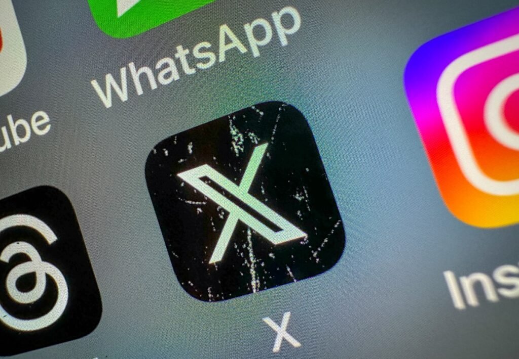 X copies Bluesky with a ‘Starterpacks’ feature that helps you find who to follow X icon on a smartphone screen