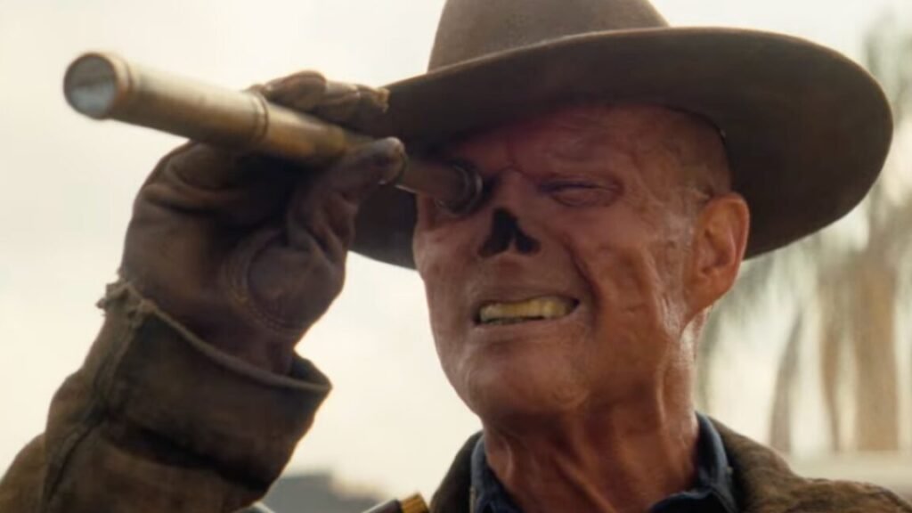 ghoul in cowboy hat with missing nose looking through a small telescope