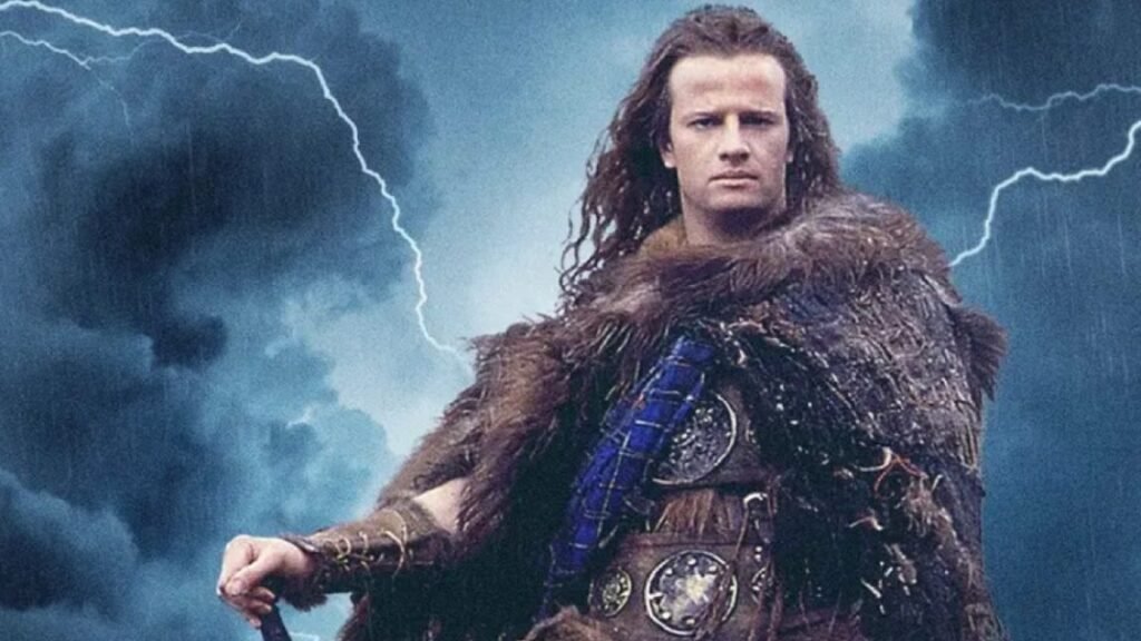 shot of a powerfully built man in a fur cape and kilt standing against a thunderous sky as lightning strikes