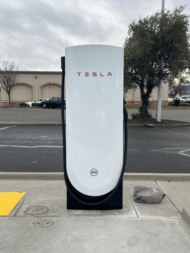 Electric vehicle charging at a fast-charging station