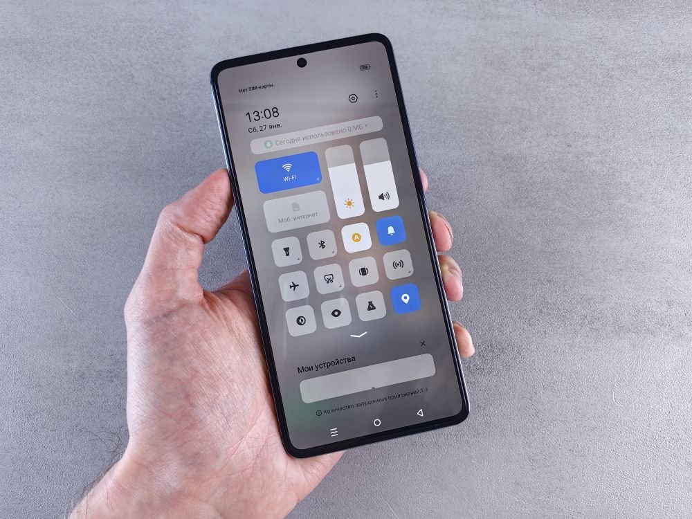 How to Clear Cache on Android: A Simple Step-by-Step Guide Hand holding an Android smartphone displaying the settings menu