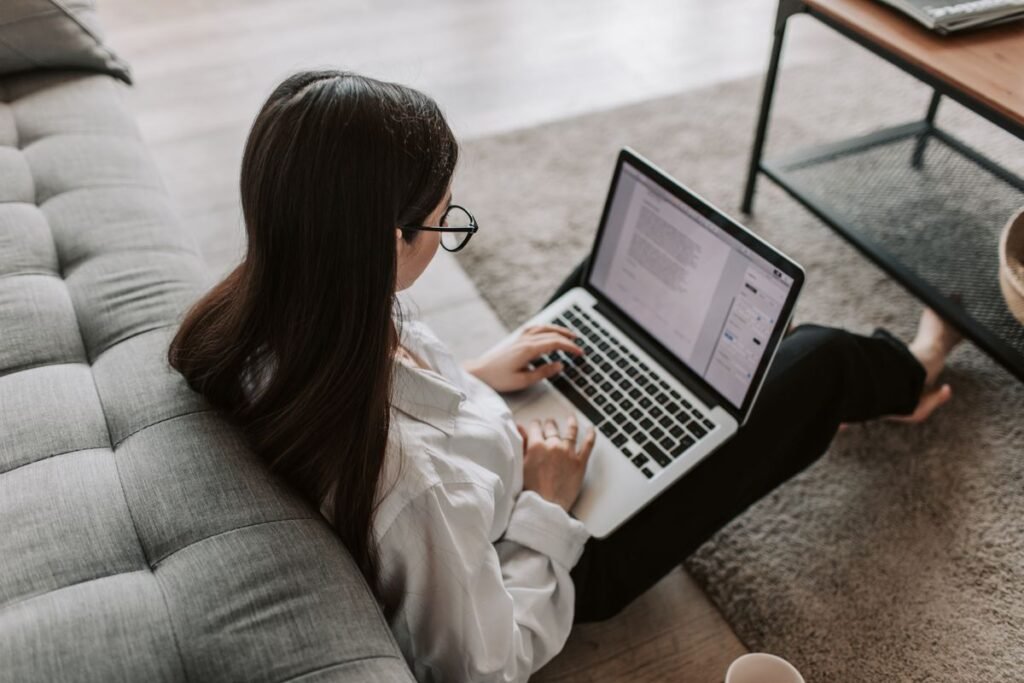 Email Etiquette: Dos and Don’ts Woman working at home using her laptop