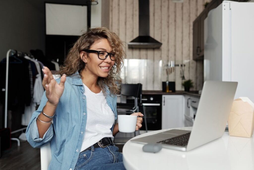 Woman using a laptop for a video call