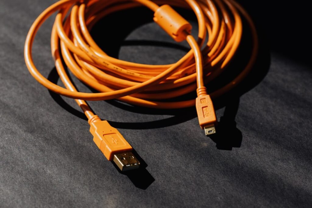iPhone 17 Pro Charger: Which One You Actually Need USB charger cable on a black surface