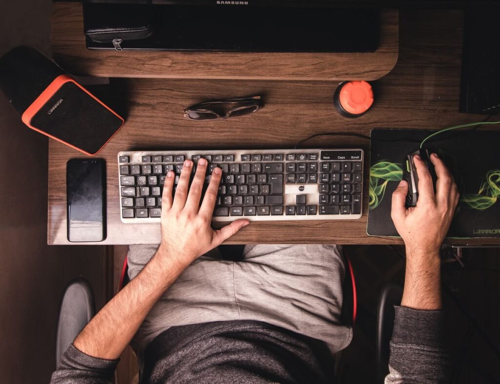 How to Give Remote Control in Zoom Man using the keyboard and mouse to control his computer