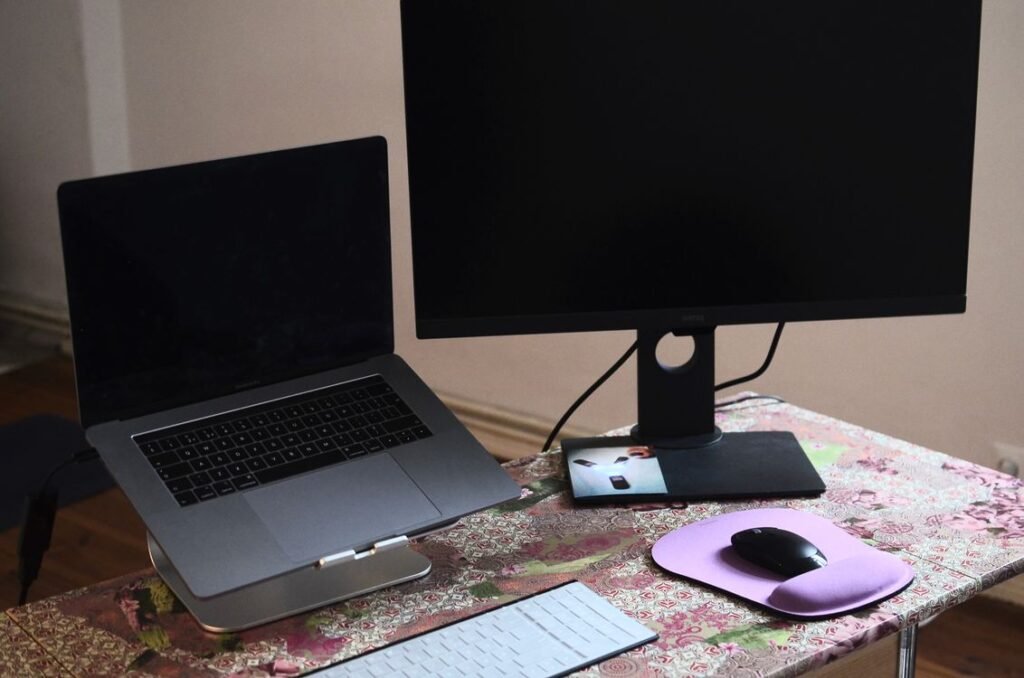 Windows laptop and monitor on a desk