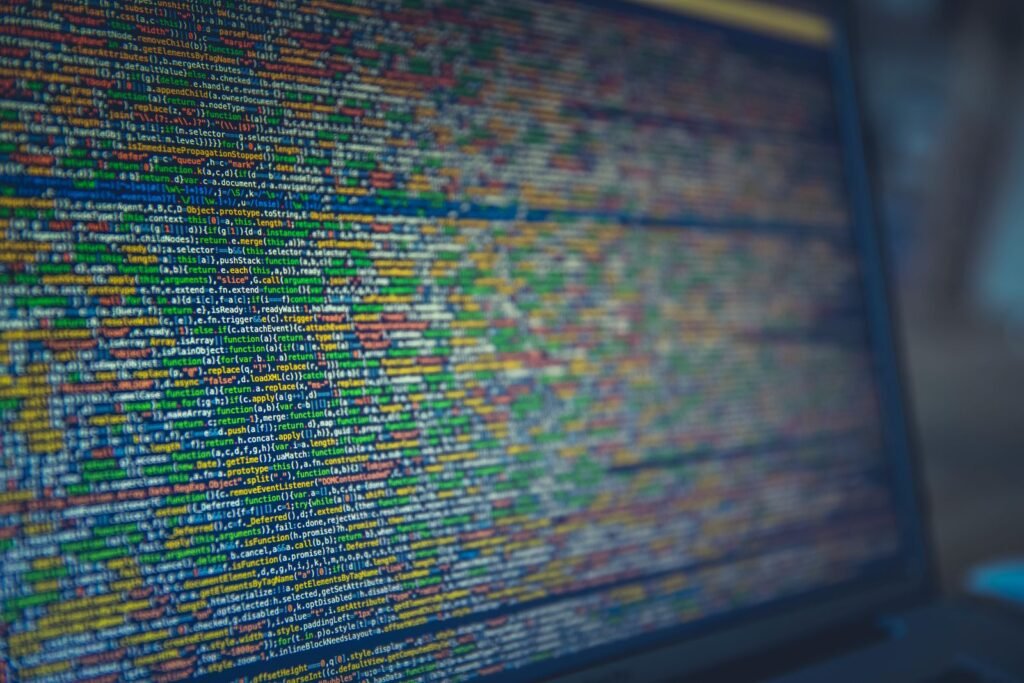 Lines of colorful source code displayed on a computer screen, representing an AI-powered Linux desktop