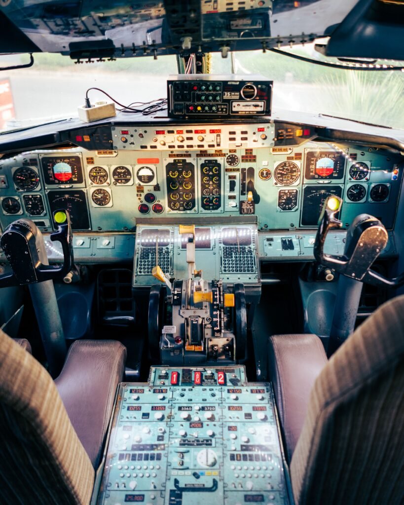 View inside an aircraft cockpit showing the instrument panel and navigation displays, representing GPS navigation loss in flight