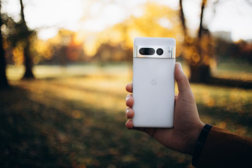 A Google Pixel smartphone held in one hand, representing the upcoming Pixel 11 Pro Fold