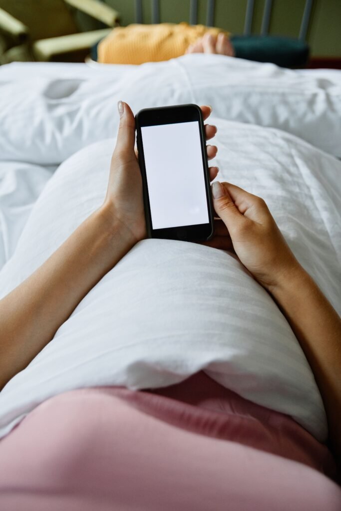 Scientists Put People in an MRI and Watched TikTok Switch Off Their Self-Control Close-up of a person scrolling short videos on a phone in bed at night