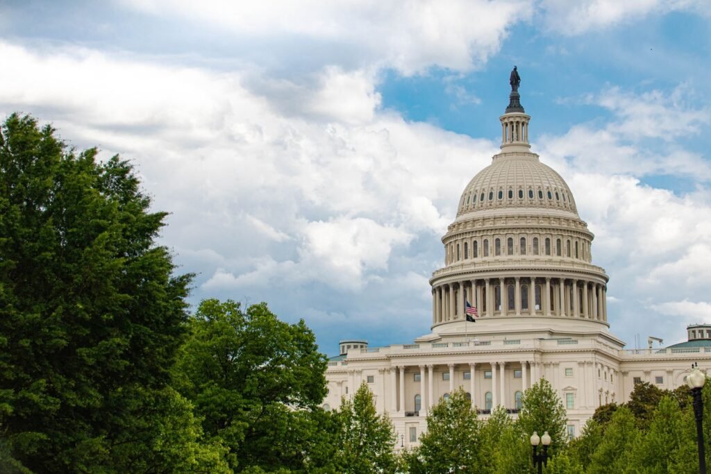 A Federal Audit Just Took Apart DOGE’s $110 Billion Savings Claim The United States Capitol building in Washington DC under a cloudy sky