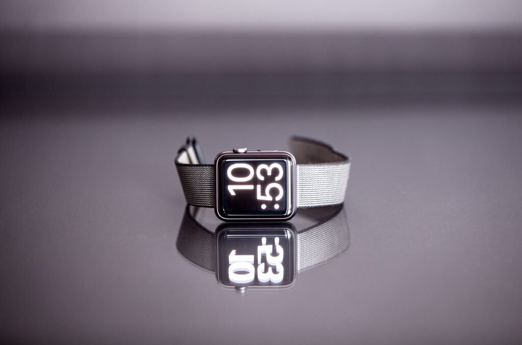 Apple Watch worn on a wrist, side profile view showing the digital crown