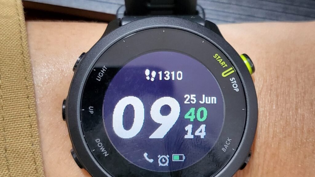 Best Smartwatch for Running in 2026: GPS Accuracy and Battery Life Compared A GPS running smartwatch worn on a runner's wrist, showing the watch face during a workout