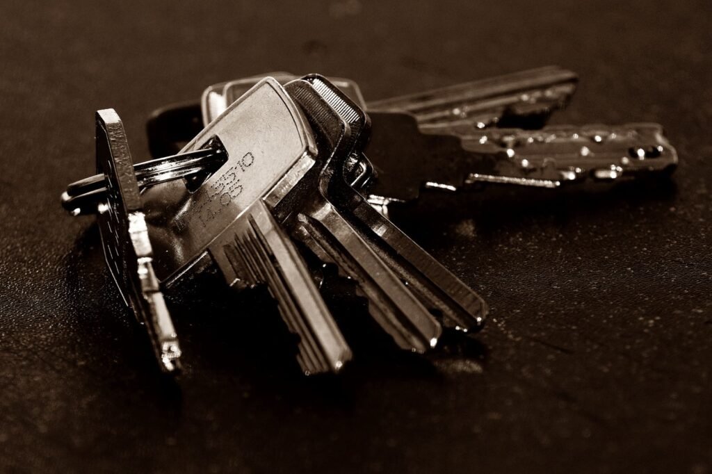 Your Phone Can Now Remember Where You Put Your Passport. It Is Not Tracking It. A set of assorted keys resting on a surface, illustrating the kind of everyday item Find Hub remembered items is designed for