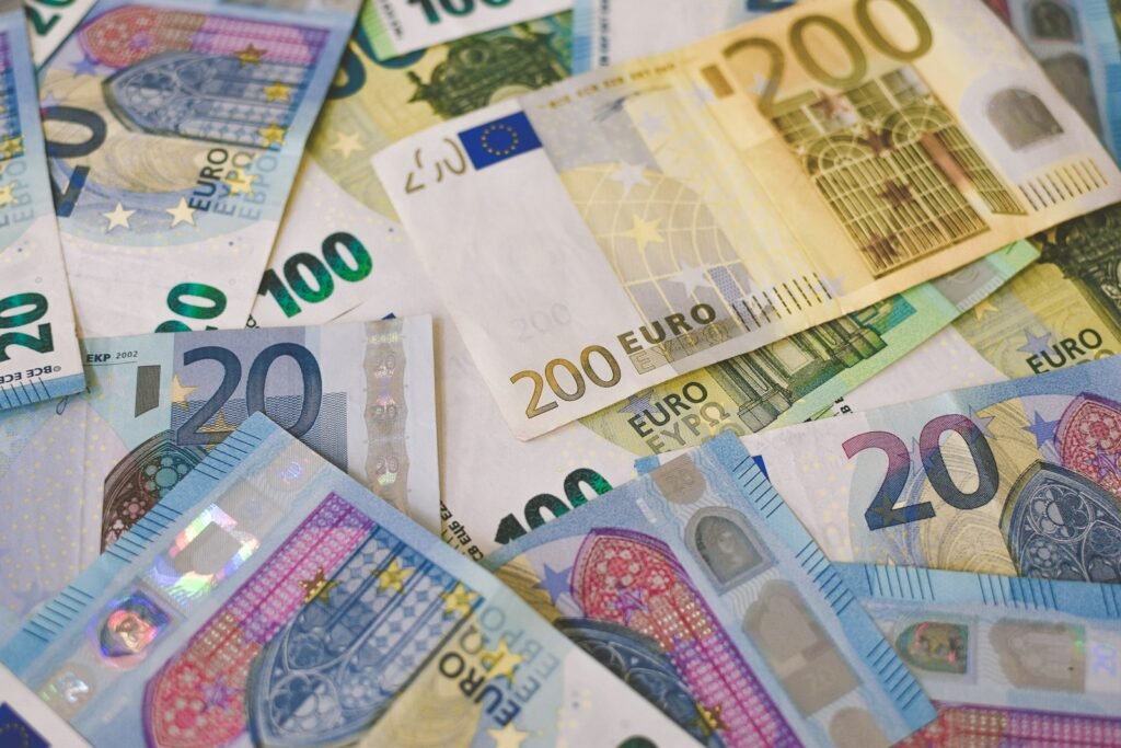 Euro banknotes spread out on a table