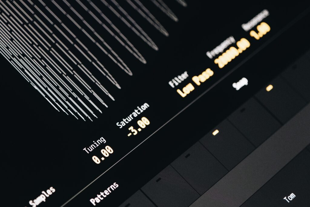 Close-up of a digital sound mixing interface with waveform and audio controls