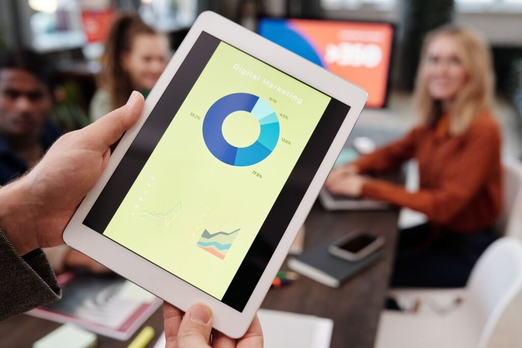 Samsung Killed Its Tri-Fold After Three Months. Huawei Just Launched Its Second One. Close-up of a hand holding a large touchscreen device, illustrating the 10.2-inch unfolded screen of the Huawei Mate XT 2 tri-fold