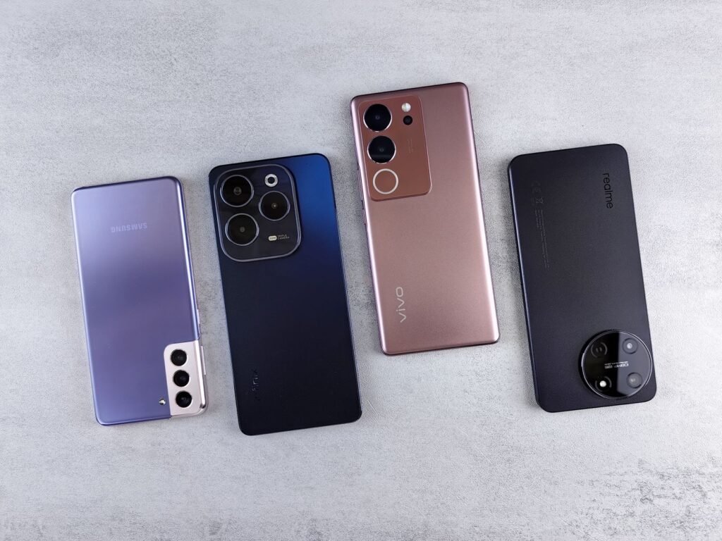 iPhone 18 Pro Colors: Every Shade in the 2026 Lineup Four smartphones in different color finishes laid out side by side, illustrating the iPhone 18 Pro color lineup