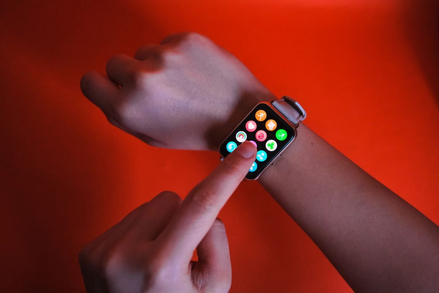 Close-up of a person wearing a smartwatch on their wrist