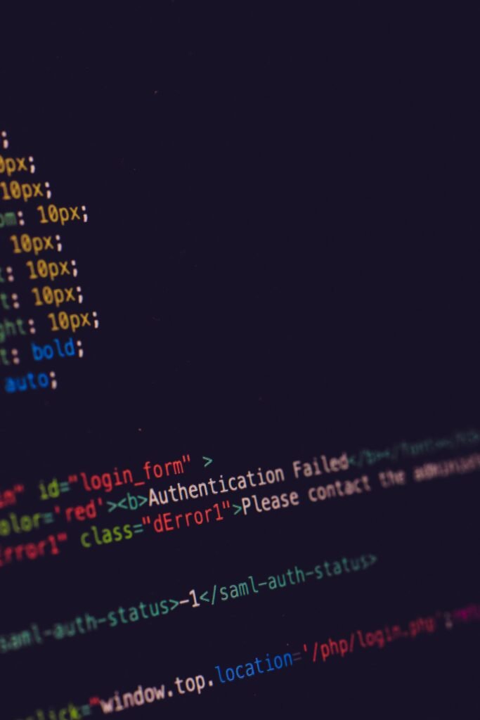 AMP for WP Plugin Vulnerability: What Was Fixed and What to Do Close up of program code on a dark screen, illustrating the AMP for WP plugin vulnerability fix