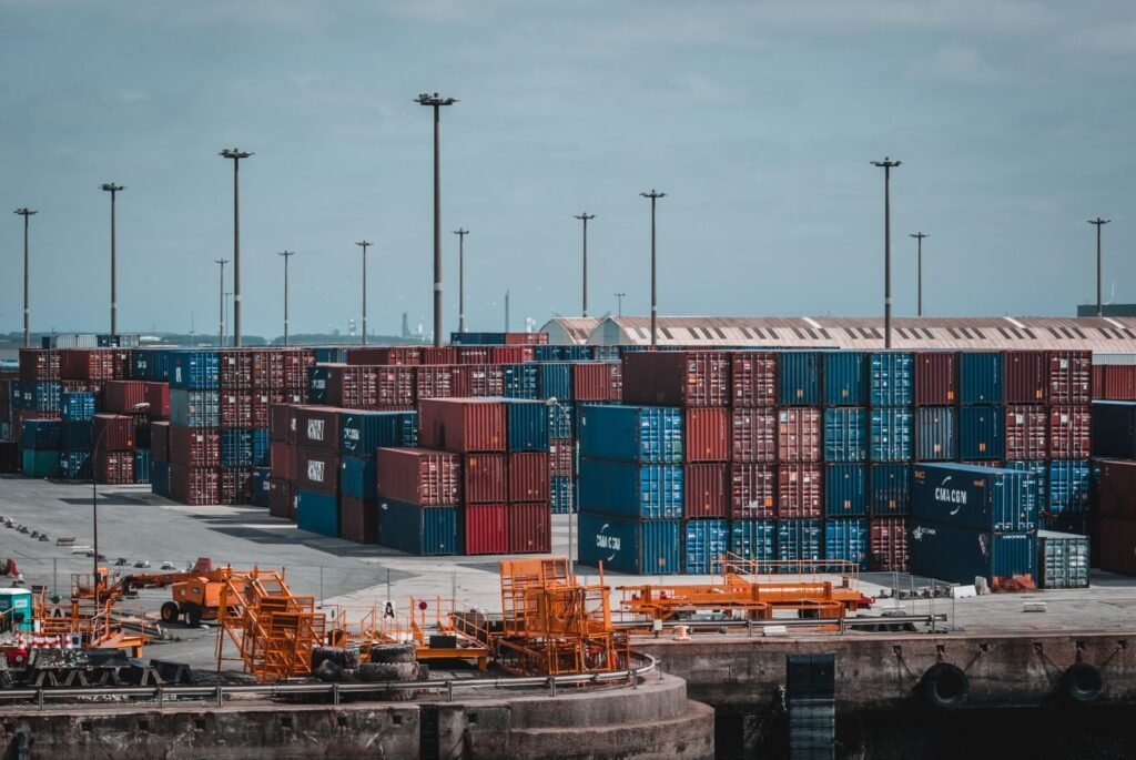 Intermodal containers stacked on a port representing Kubernetes pods in Minikube