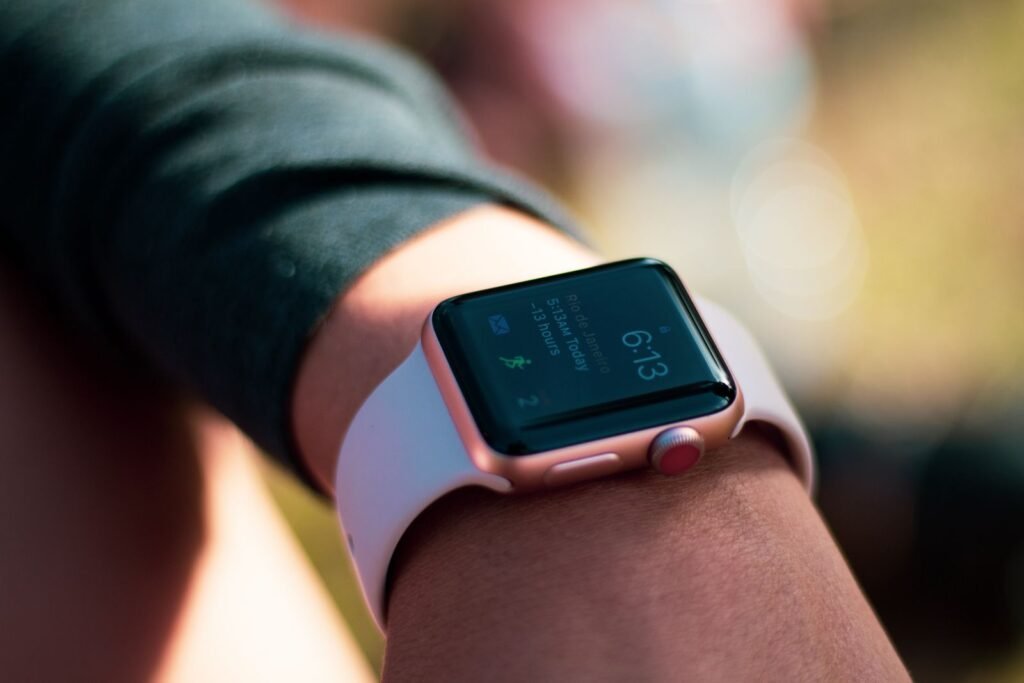 Apple Watch worn on a wrist displaying its digital watch face