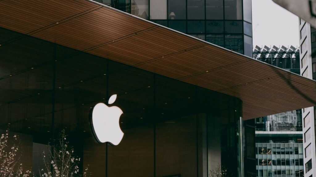 Apple Store with a glass facade in a city street
