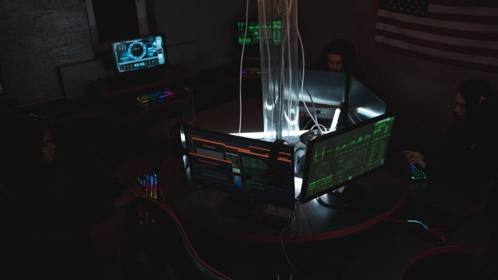 AI and National Security: Why Governments Watch Big Tech AI Cybersecurity team working in a dimly lit room