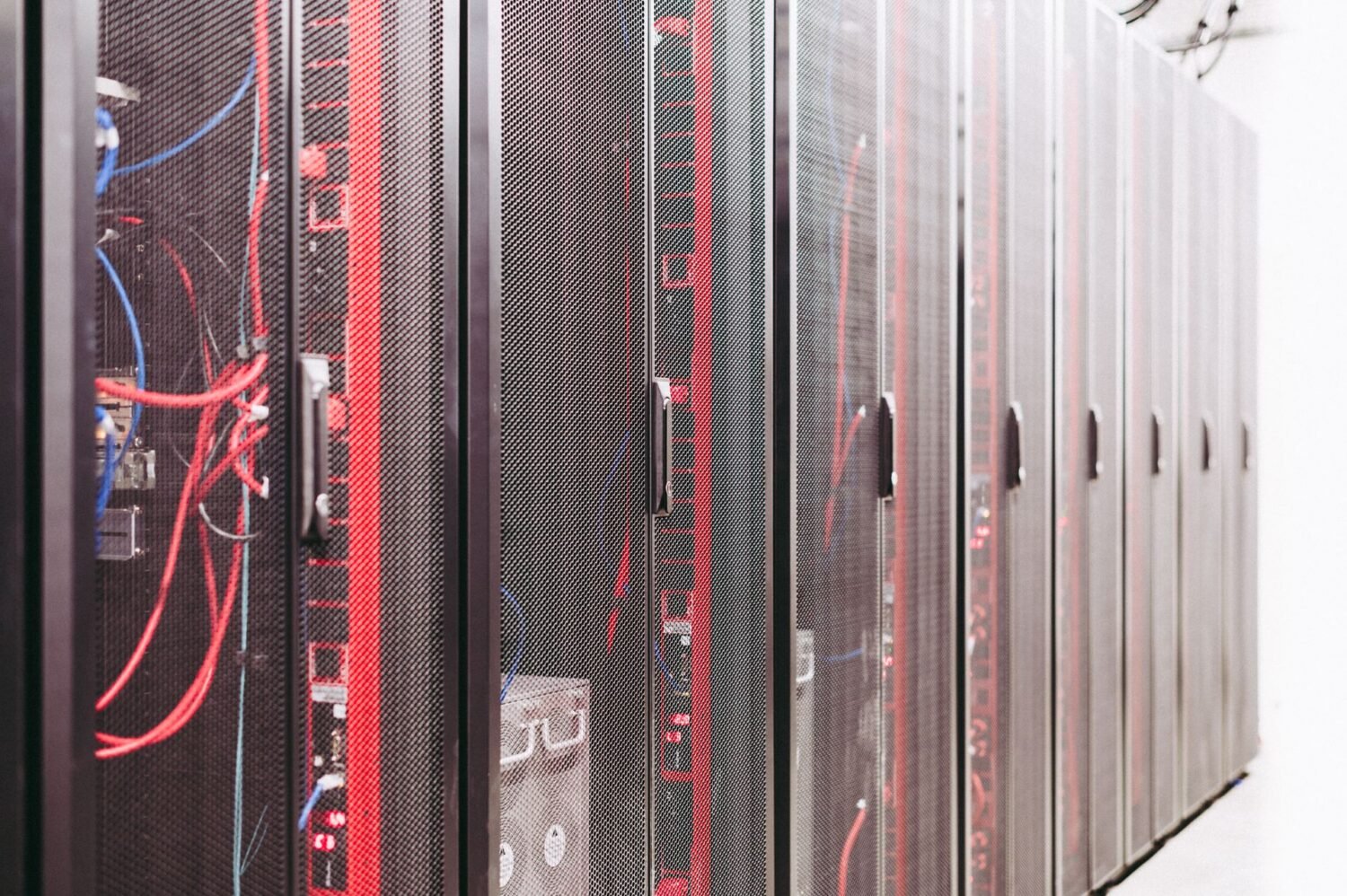 Rows of server racks in a data center