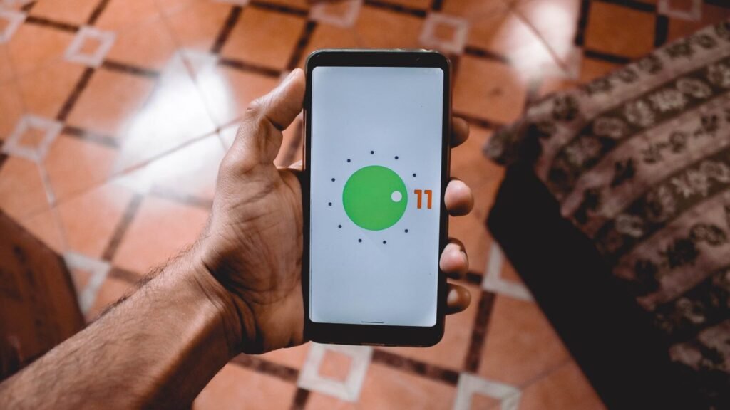 Why Android Users in the EU Get Browser and Search Choices Hand holding an Android smartphone