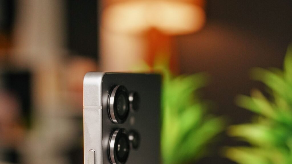 Sleek smartphone with a triple rear camera in close-up