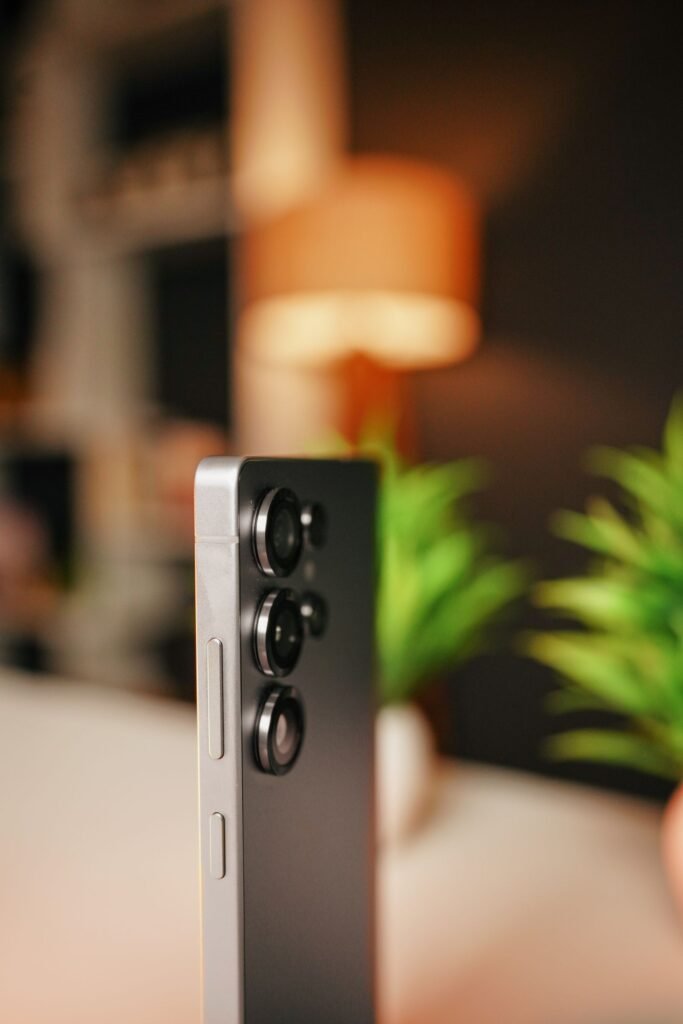 Sleek smartphone with a triple rear camera in close-up