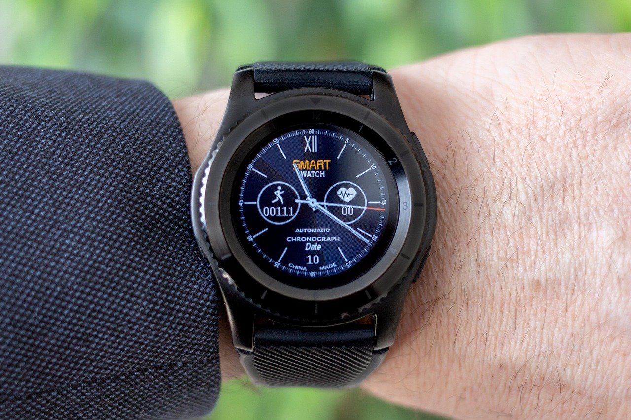 Close-up of a smartwatch worn on a wrist tracking heart rate and sleep data