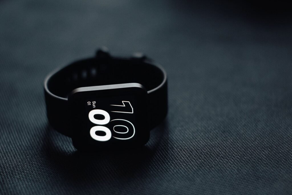 Smartwatch on a wrist showing the time