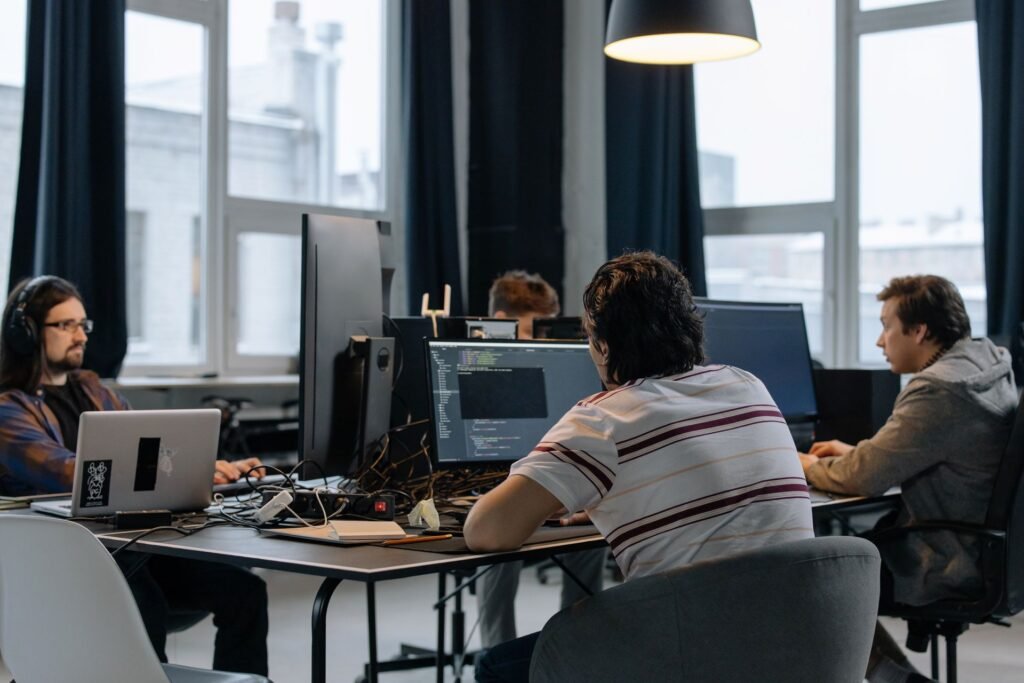 Developers working at computers in a studio office