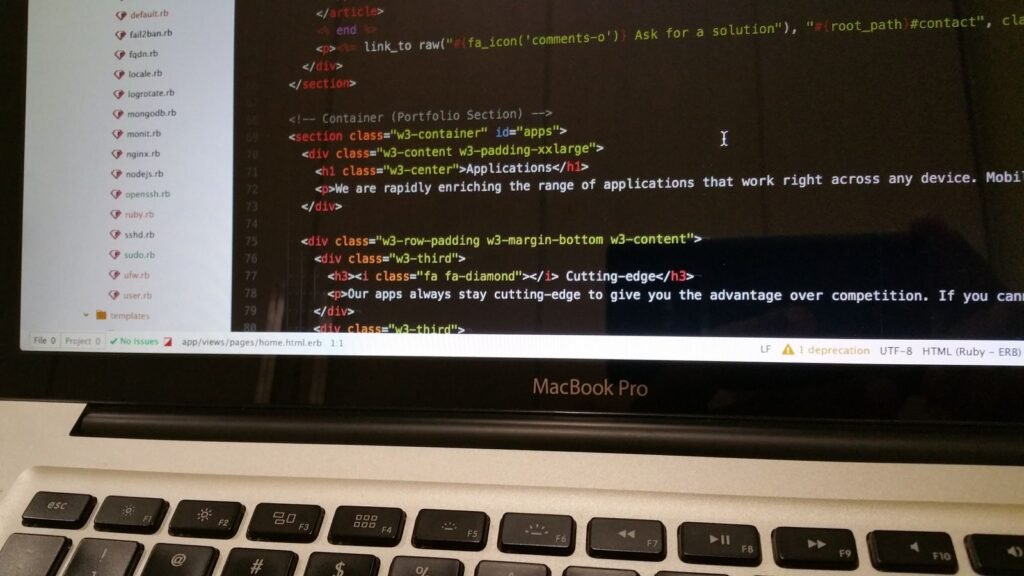 Close-up of a MacBook Pro screen showing code, illustrating Meta's Muse Spark Open model running locally on Apple hardware