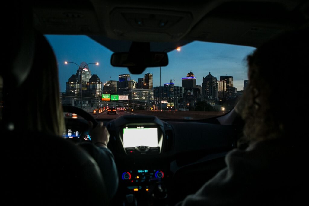 Kevin Hart Passed on Uber Because It Sounded Like “Murderville.” We Did the Math on His $100 Million Regret. Driver and passenger inside a car during a ride