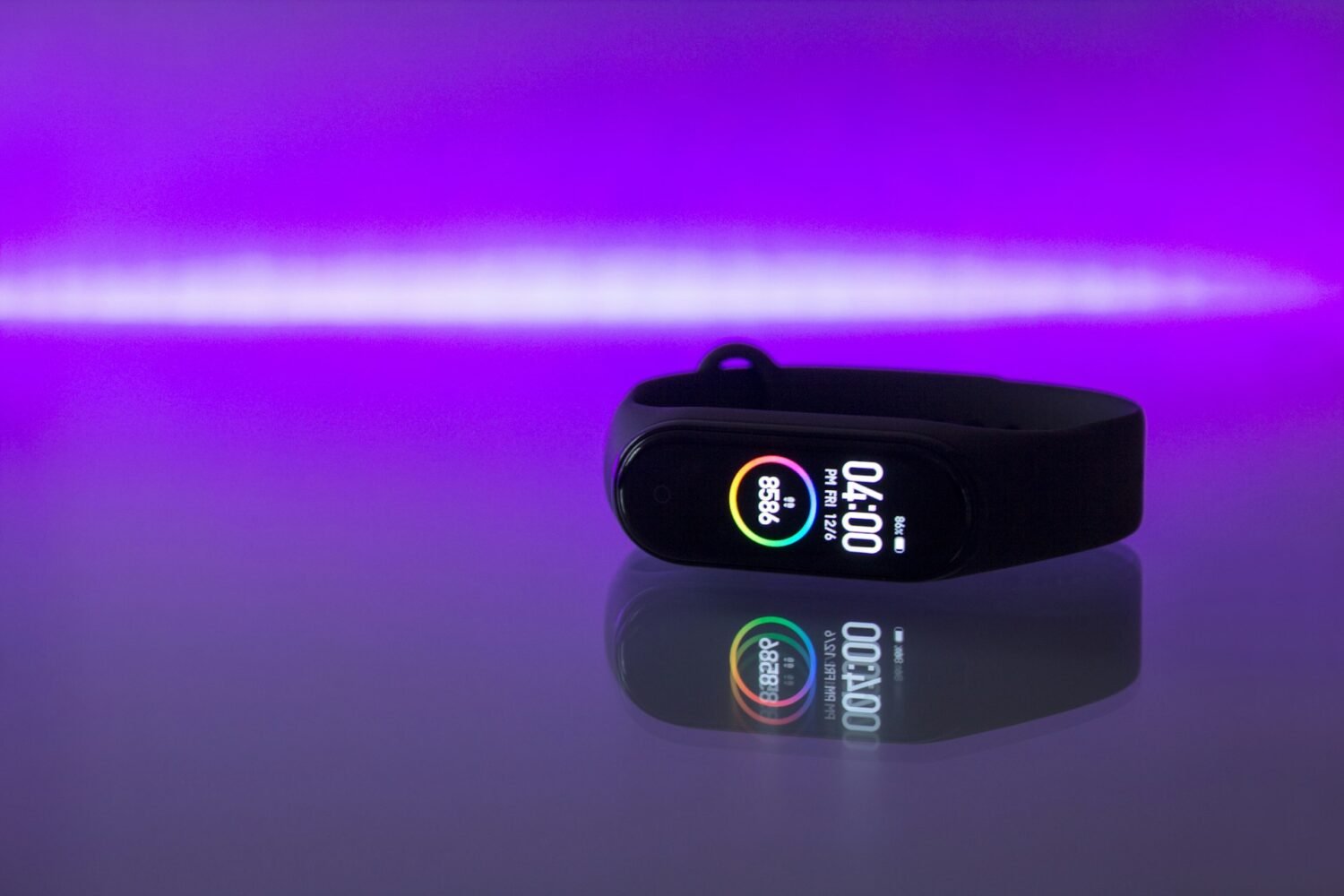 Black fitness tracker band worn on a wrist