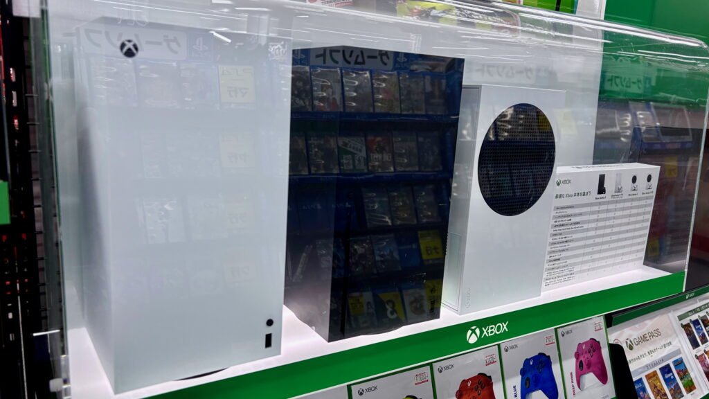 Xbox Series X and Xbox Series S consoles on a store shelf